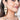 Aatreya Premium Designer Earrings featuring layered cowrie shells, faux pearl accents, handcrafted antique gold detailing, and cascading statement design
