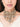 Handcrafted Aatvi Majestic Shell Choker featuring brass metal, shell motifs, pearl accents and intricate beadwork with an elegant Antique Finish.