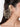 Aisha Ethnic Pearl Earchain handcrafted with cascading brass chains, faux pearls, glass bead accents, and a Gold Tone Finish, perfect for brides, Haldi, Mehndi, Sangeet, wedding ceremonies, receptions, and luxury bridal styling.