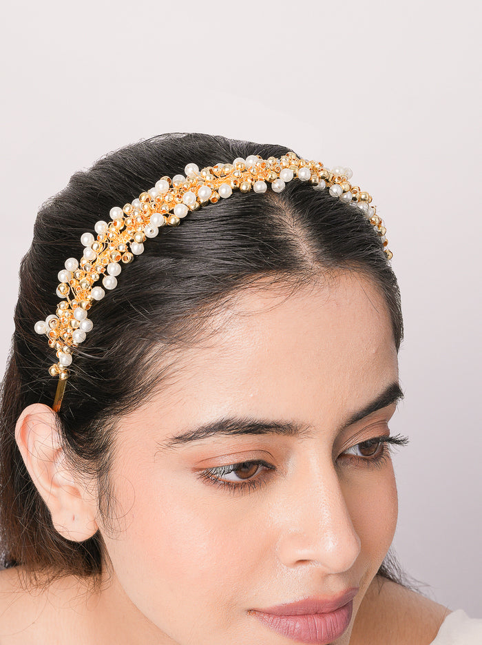 Ruhi Pearl Cluster Hairband featuring handcrafted faux pearl clusters with intricate bead detailing and elegant gold tone finish for bridal and festive hairstyles.