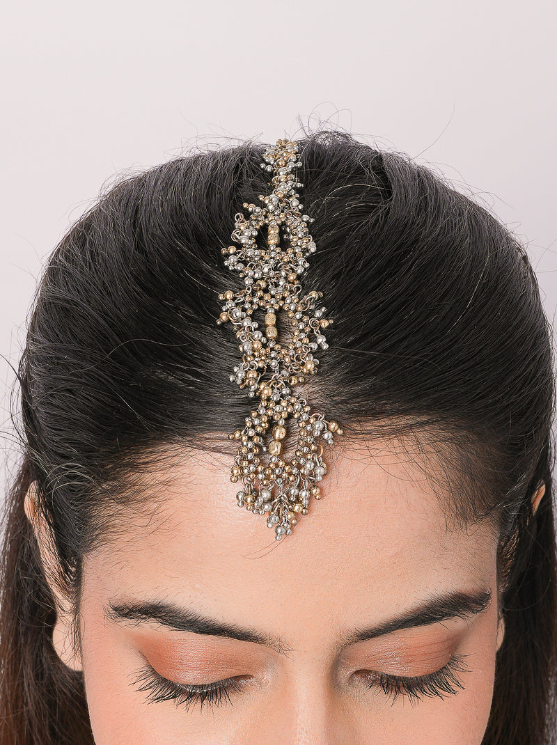 Handcrafted Anokhi Artisan Maangtika Jewel featuring brass metal, intricate beadwork and pearl accents with an elegant Antique Finish for bridal and festive wear.
