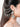 Ashi handcrafted statement earrings featuring intricate beaded detailing with a silver tone finish, ideal for weddings, festive celebrations, and contemporary ethnic styling.