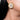 Babita Beaded Stud Earrings featuring intricate ivory beads, faux pearls and gold-tone detailing, styled on a woman.