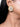 Babita Beaded Stud Earrings featuring intricate ivory beads, faux pearls and gold-tone detailing, styled on a woman.