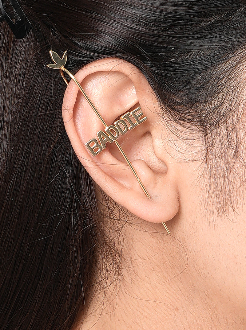 Baddie Moodcuff pair handcrafted in brass metal with bold BADDIE lettering, butterfly accent, and a Gold Tone Finish, perfect for parties, birthdays, concerts, vacations, festive occasions, and contemporary statement styling.