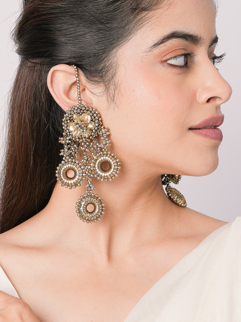 Bhagya Antique Chand Earrings featuring handcrafted floral detailing, cascading circular charms and antique gold finish for bridal, festive and traditional wear.