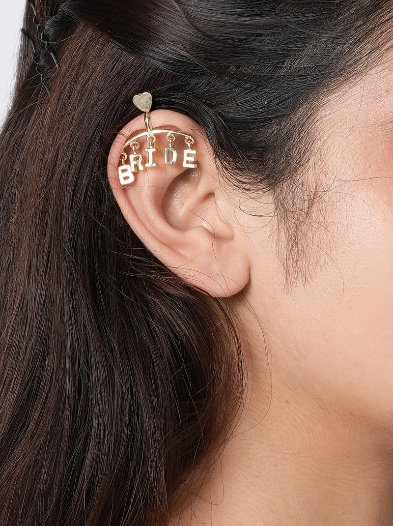 Bride Moodcuff handcrafted in brass metal with enamel BRIDE lettering and a Gold Tone Finish, perfect for bridal showers, bachelorette parties, wedding celebrations and modern bridal styling.