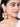 Bushra Embroidered Shell Earrings featuring natural cowrie shells, faux pearls, intricate beadwork, and gold tone finish.