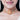 Chitra Floral Pearl Choker handcrafted with floral motifs, pearl embellishments, peach bead detailing, and an elegant gold tone finish for festive and wedding styling.
