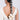 Dama Designer Hair Parandi handcrafted with white braided cotton threads, oversized fabric pom poms and handcrafted detailing, designed for bridal braids, festive hairstyles, mehendi, haldi and traditional celebrations.