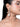 Devi Statement Crystal Earrings featuring crystal accents, pearl detailing and a large teardrop pearl drop, styled on a woman.