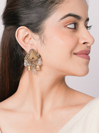 Dhara Crystal Tassel Earrings featuring antique gold lattice detailing, sparkling crystal embellishments, handcrafted tassel charms, and elegant statement styling for bridal and festive occasions.