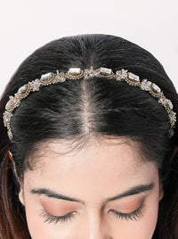 Handcrafted Dharmi Crystal Designer Hairband featuring baguette-cut crystals, intricate beadwork, and an antique gold finish for bridal, festive, and wedding hairstyles.