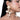 Dhriti Bridal Statement Earrings featuring pearl detailing, ivory shell accents and intricate gold-tone beadwork styled on a woman.