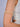 Diva handmade pearl bajuband with gold-tone layered chains and delicate faux pearl detailing worn on the upper arm.