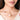 Drip Choker featuring pearl accents on a sculptural gold-tone collar necklace, contemporary statement jewelry for weddings, festive wear, and modern fashion styling.