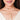 Drip Necklace featuring cascading pearl accents suspended from a gold-tone chain, contemporary statement jewelry for festive wear, wedding styling, and modern fashion.