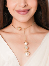 Drip Necklace featuring cascading pearl accents suspended from a gold-tone chain, contemporary statement jewelry for festive wear, wedding styling, and modern fashion.