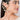 Drip Rays Earcuff featuring cascading gold-tone rays and pearl accents, statement ear jewelry for contemporary fashion, festive styling, and elevated occasion wear.