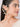 Drip Rays Earcuff featuring cascading gold-tone rays and pearl accents, statement ear jewelry for contemporary fashion, festive styling, and elevated occasion wear.