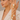 Drip Cuff featuring sculptural gold-tone curves with cascading pearl accents, statement hand jewelry for contemporary fashion, weddings, and festive styling.