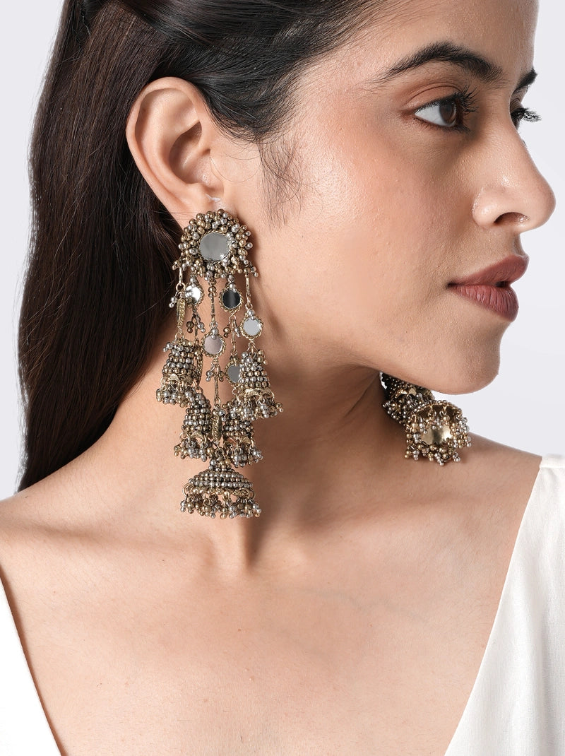 Elara Antique Fashion Earrings handcrafted with mirror work, layered jhumka drops, glass bead detailing, and brass metal in an Antique Tone Finish, perfect for weddings, festive celebrations, mehendi, sangeet, receptions, and ethnic occasions.