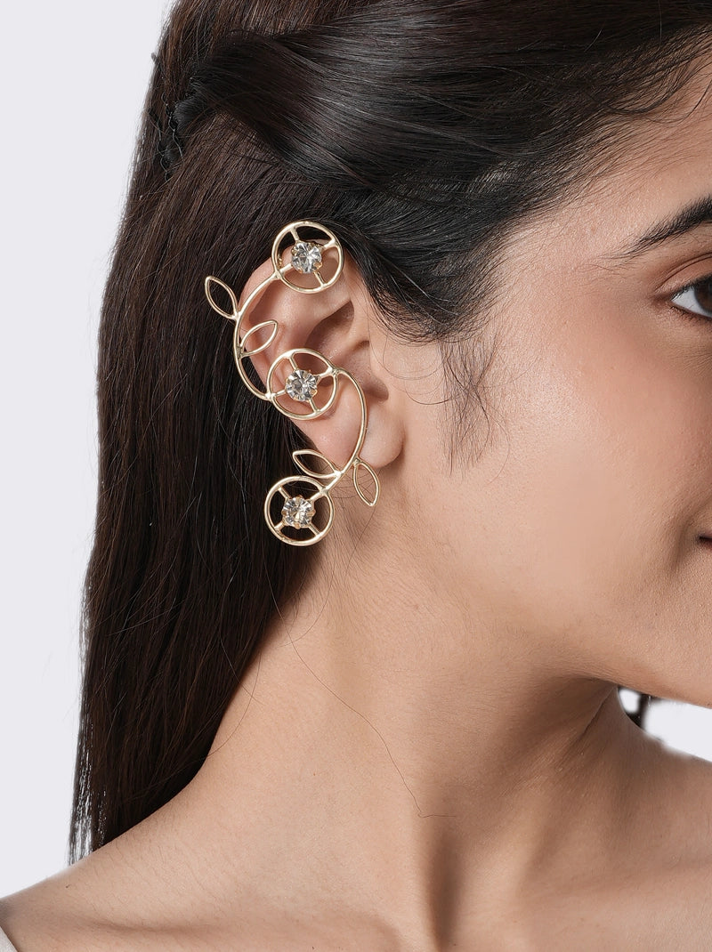 Elara Crystal Floral Earring handcrafted with sparkling glass stone floral motifs, elegant vine-inspired brass metal detailing, and a Gold Tone Finish in a contemporary ear cuff design, perfect for weddings, festive occasions, cocktail parties, and modern styling.