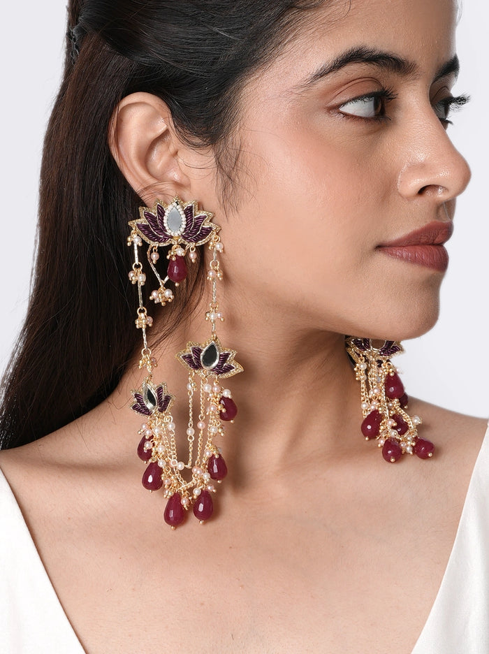 Elodie Lotus Ethnic Earrings handcrafted with embroidered lotus motifs, glass stones, faux pearls, wine glass drops, and brass metal in a Gold Tone Finish, featuring cascading bead detailing perfect for weddings, mehendi ceremonies, sangeet nights, festive occasions, receptions, and elegant ethnic styling.