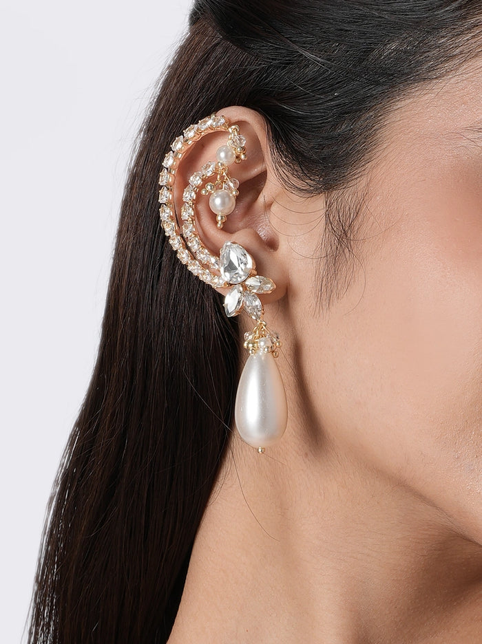 Elowen Crystal Pearl Earring handcrafted with sparkling glass stones, faux pearls, a teardrop pearl pendant, and a crystal ear cuff in a Gold Tone Finish, perfect for weddings, receptions, cocktail parties, festive occasions, and bridal styling.