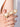 Esha shell statement ring featuring three ivory shell motifs, pearl accents, and gold-toned handcrafted detailing.