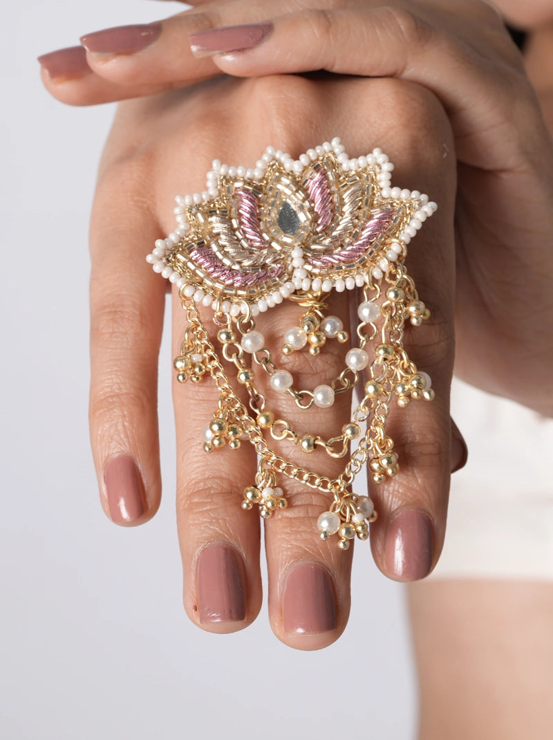 Freya Embroidered Floral Ring handcrafted with blush pink floral thread embroidery, faux pearls, glass beads, a glass stone centerpiece, and cascading brass chain accents, perfect for haldi, mehendi, weddings, and festive occasions.