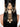 Gayatri Statement Hair Accessory featuring peach floral motifs, faux pearls, gold-tone beads and cascading embellishments styled on long hair.