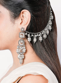 Inaaya handcrafted long silver statement earrings in brass metal with an elegant silver tone finish for weddings, festive occasions, cocktail parties, and contemporary ethnic styling.