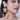 Ishani Floral Statement Earrings featuring handcrafted floral motifs, glass stones, faux pearls, cascading floral bell drops, and antique gold finish designer bridal jewelry.