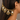 Jivika Regal Antique Earchain handcrafted with brass metal, oval glass stone motifs, delicate glass bead tassels, and an Antique Tone Finish, perfect for bridal wear, weddings, festive occasions, and traditional Indian styling.