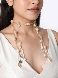 Kanak Modern Designer Choker handcrafted with mirror accents, faux pearls, delicate glass bead detailing, cascading pearl strands, shell-inspired charms, and a Gold Tone Finish, perfect for weddings, haldi, mehendi, festive occasions, and modern bridal styling.