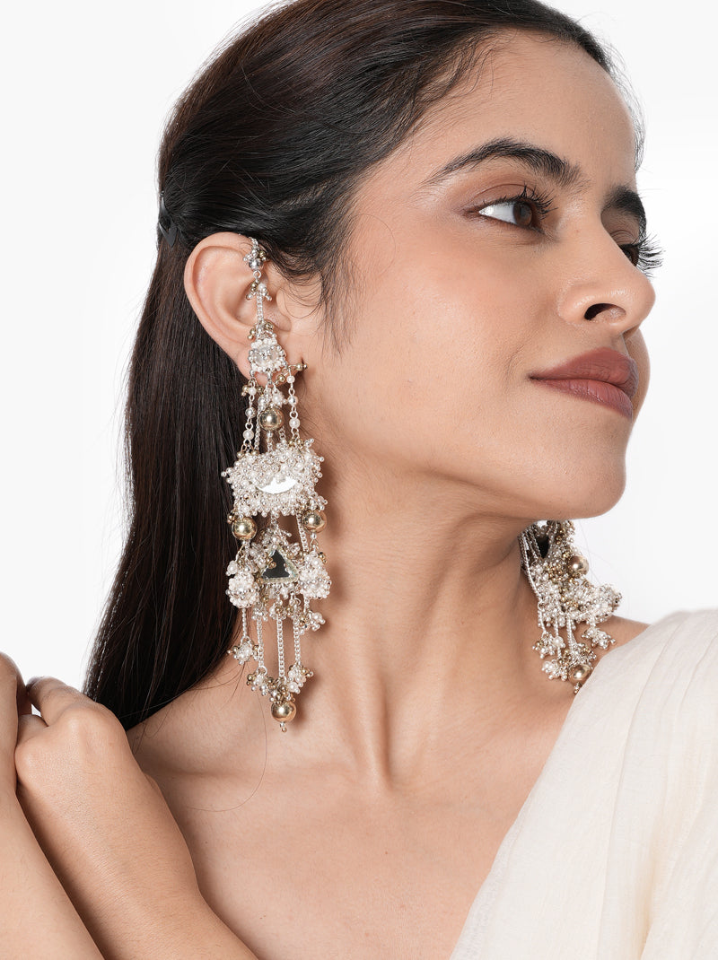 Kashvi Pearl Modern Earrings handcrafted with faux pearls, mirror accents, intricate glass bead embroidery, cascading metallic drops, and a Silver Tone Finish, perfect for weddings, receptions, festive celebrations, cocktail parties, and elegant contemporary styling.