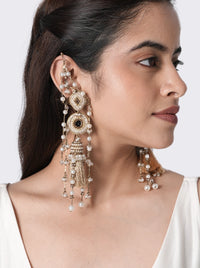 Komal Pearl Ethnic Earrings handcrafted with faux pearls, cotton thread tassels, glass bead detailing, and brass metal in a Gold Tone Finish, featuring intricate woven circular motifs for weddings, mehendi ceremonies, haldi celebrations, festive occasions, and elegant ethnic styling.