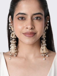 Komal Pearl Ethnic Earrings handcrafted with faux pearls, cotton thread tassels, glass bead detailing, and brass metal in a Gold Tone Finish, featuring intricate woven circular motifs for weddings, mehendi ceremonies, haldi celebrations, festive occasions, and elegant ethnic styling.