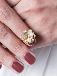 Lasya Pearl Floral Ring handcrafted with sculpted gold petals, faux pearl accents, crystal detailing, adjustable band, and luxurious Gold Tone Finish for festive and statement styling.