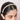 Lavira Crystal Pearl Hairband featuring handcrafted baguette-cut glass crystals, faux pearl detailing and elegant gold tone finish for bridal and festive hairstyles.