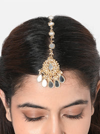 Shop Lisa Mirror Designer Maangtika handcrafted with mirror detailing, glass beads and Gold Tone Finish. Perfect for bridal wear, Haldi, Mehndi and festive occasions.