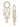 Madhu Pearl Bridal Kaleera featuring handcrafted faux pearl tassels, floral bead detailing, cascading pearl clusters, and a luxurious gold tone finish for bridal weddings and festive celebrations.