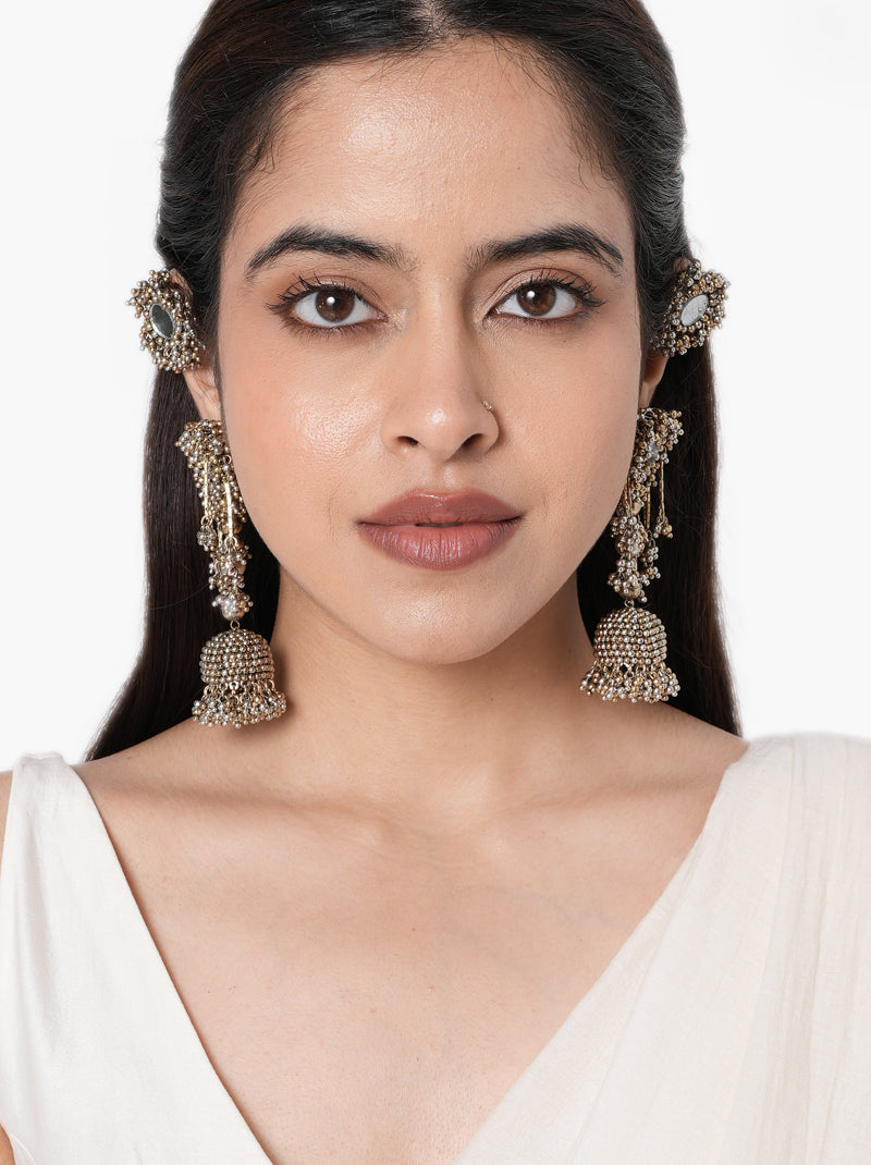 Mahi Antique Handmade Earrings handcrafted with mirror accents, intricate glass bead embroidery, cascading bead tassels, jhumka detailing, matching earcuff, and an Antique Tone Finish, perfect for weddings, Mehndi, festive celebrations, receptions, and elegant traditional styling.