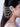 Mahnoor Pearl Crystal Earchain featuring layered faux pearl chains, faceted glass crystal drops, handcrafted bead detailing, and antique gold finish designer bridal hair jewelry.
