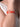Model wearing Mary Drip Statement Bracelet featuring a sculptural coral red enamel open cuff with contemporary handcrafted artistic design.