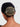 Maze Geometric Bun Cover handcrafted in brass metal with a Gold Tone Finish, featuring a contemporary open-grid cage design secured with a hair stick for elegant bun hairstyles.