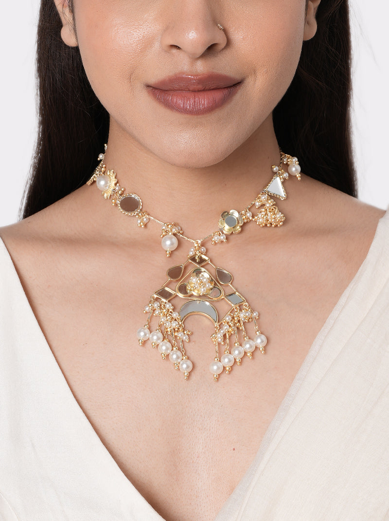 Medha Mirror Crescent Necklace handcrafted with geometric mirror accents, a crescent pendant, faux pearl drops, intricate glass bead detailing, and a Gold Tone Finish, perfect for Haldi, Mehndi, weddings, receptions, festive celebrations, cocktail parties, and contemporary ethnic styling.