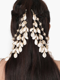 Naina Bridal Shell Earchain handcrafted with natural shell motifs, faux pearls, intricate glass bead embroidery, cascading floral chains, and a Gold Tone Finish, perfect for Haldi, Mehndi, Sangeet, destination weddings, receptions, and luxury bridal styling.