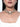 Nayantara Handmade Pearl Choker featuring a floral-inspired centre motif, faux pearl detailing, intricate glass beadwork and gold-tone accents, styled on a woman.